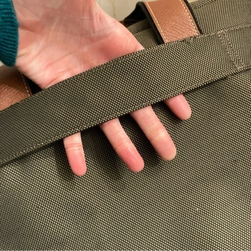 Longchamp canvas and leather duffle travel bag unisex